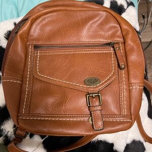 Brown backpack brand is b.o.c brand new basically. used like once or twice